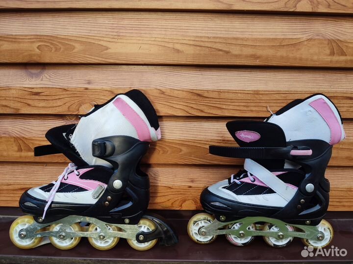 Роликовые коньки