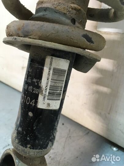 Стойка подвески задняя левая Geely Emgrand Ec7