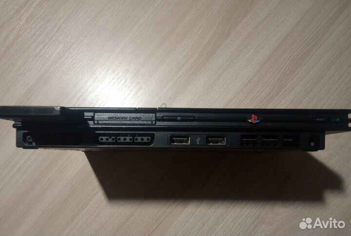 Игровая консоль PlayStation 2 и 2 игры