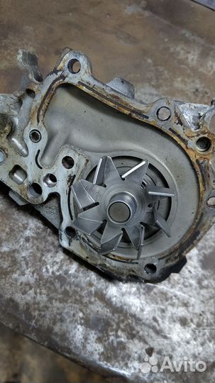 Помпа Renault logan 1