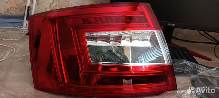 Заданий левый фонарь Skoda Octavia а7