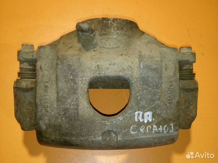 Суппорт тормозной передний правый Kia Cerato 04-08