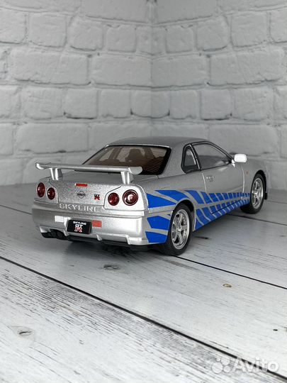 Модель автомобиля nissan skyline GTR 1/24