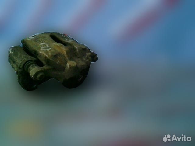 Суппорт передний левый Kia Cerato 2009-2013