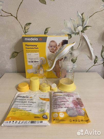 Молокоотсос medela ручной и пакеты к нему