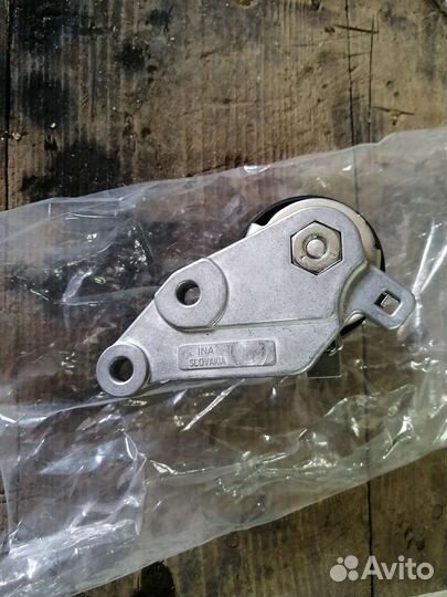 Натяжной ролик ремня грм на форд фокус 1