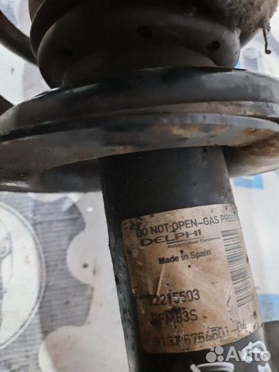 Стойка амортизатора передняя левая Bmw X5 E53