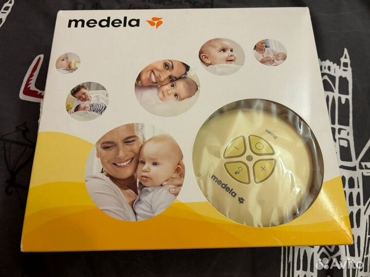 Молокоотсос medela swing электрический