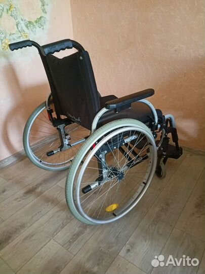 Инвалидная коляска