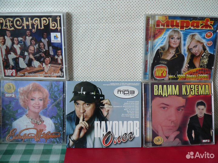 Компакт-диски и видеокассеты