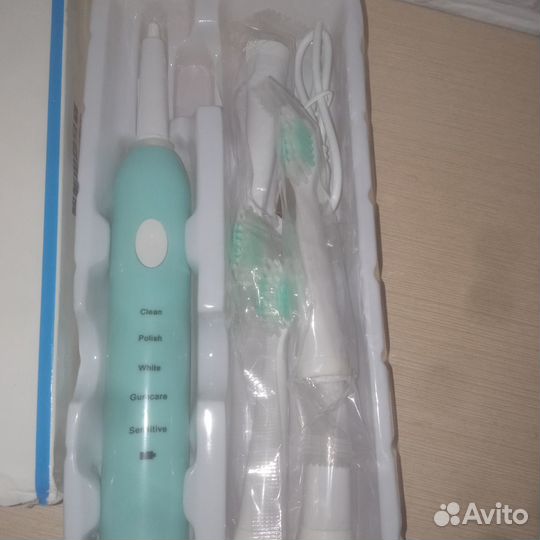 Электронная зубная щетка