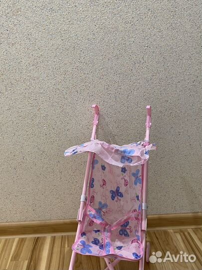 Игрушечная коляска для кукол