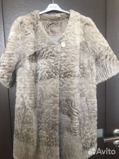 Меховая жилетка