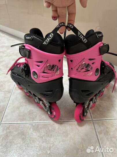 Роликовые коньки