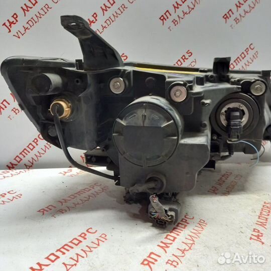 Фара ксеноновая передняя левая Mitsubishi