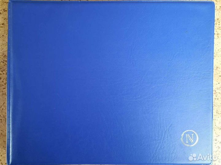 Коллекция монет в альбоме на 708 ячеек