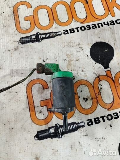 Моторчик омывателя фар Nissan Terrano R20