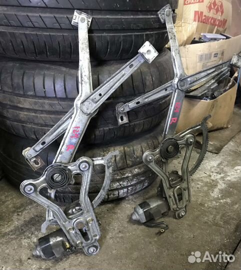 Стеклоподъемник электрический правый Mercedes W124