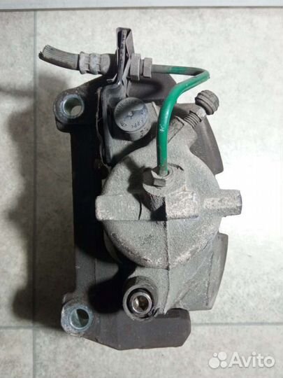 Суппорт тормозной передний левый Renault Laguna 2