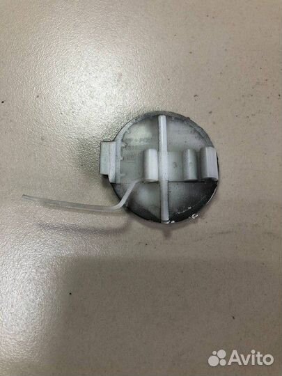 Заглушка буксировочного крюка переднего бампера