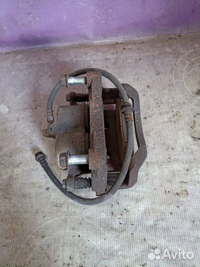 Суппорт тормозной передний правый Renault Koleos