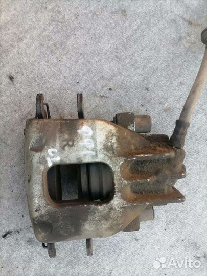 Супорт тормозной Форд Фокус 1