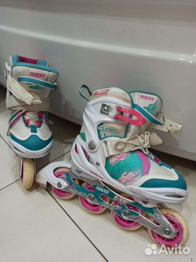 Роликовые коньки