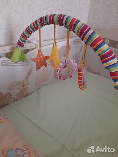 Дуга с игрушками