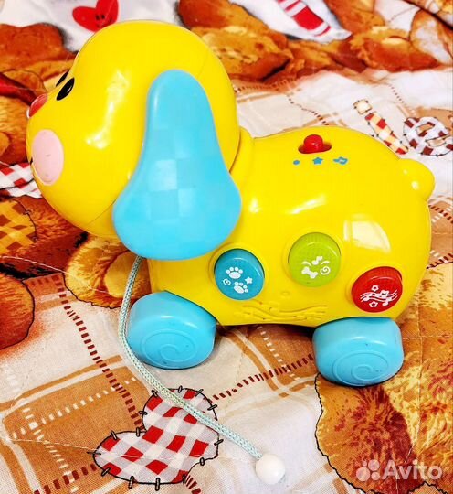 Каталка музыкальная BabyGo щенок