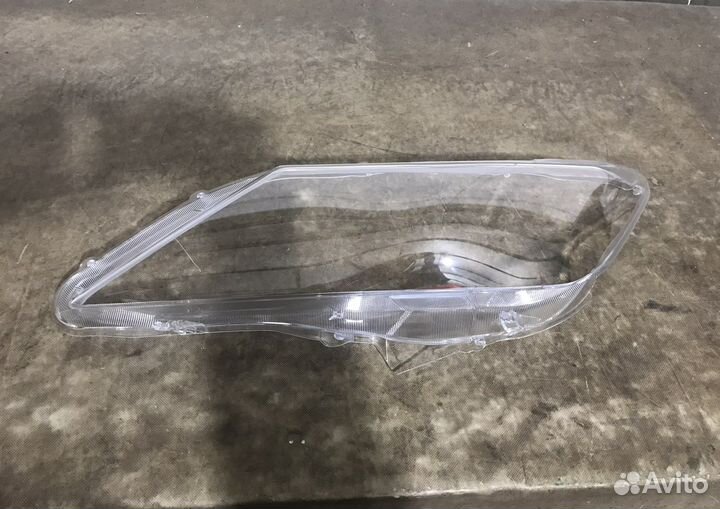 Стекло левой фары Toyota Camry 50