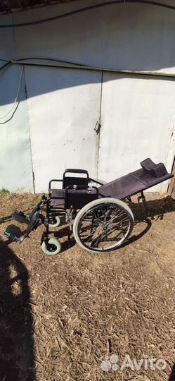 Инвалидная коляска с откидной спинкой