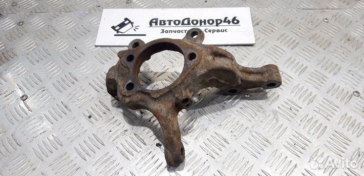 Кулак поворотный передний левый Nissan Tiida C11