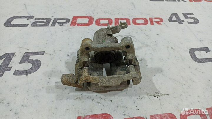 Суппорт задний правый б/у для Audi A3 (1K0615424M)