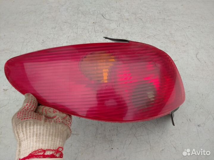 Фонарь задний левый Пежо 206