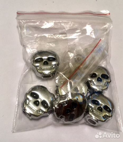 Бутоны/крутилки колков с черепами