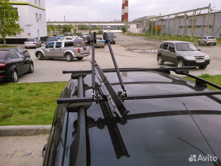 Велокрепление amos на крышу автомобиля