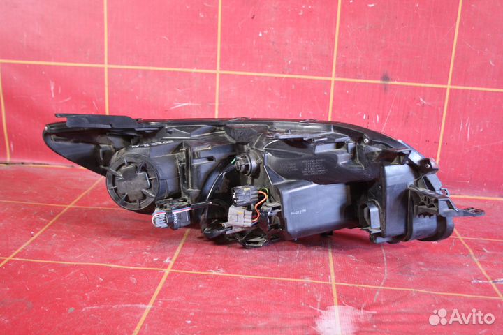 Фара левая Mitsubishi Pajero Sport