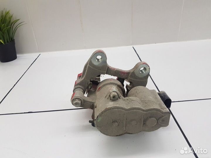 Суппорт задний левый (Geely Coolray)