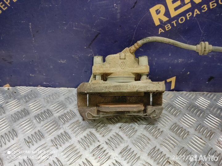 Суппорт передний правый Renault Fluence седан 1.6