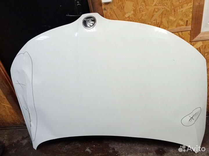 Капот Skoda Rapid