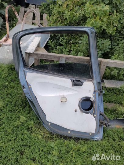 Дверь задняя левая пежо 206