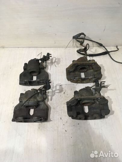 Суппорт тормозной передний левый Пассат Б5