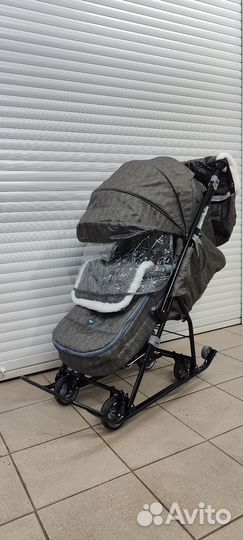 Новые функциональные санки - коляска