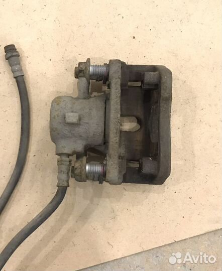 Суппорт тормозной задний правый Land Rover Freelan