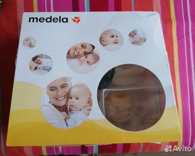 Молокоотсос medela swing электрический