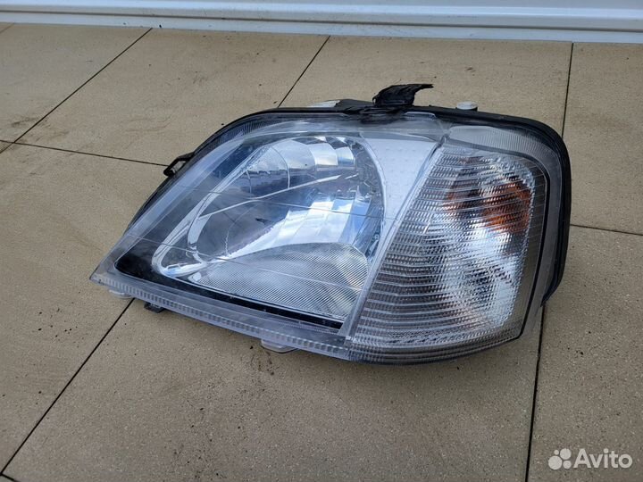 Фара передняя левая Renault Logan