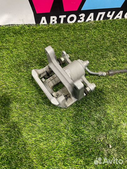 Суппорт тормозной задний правый Buick Encore GX