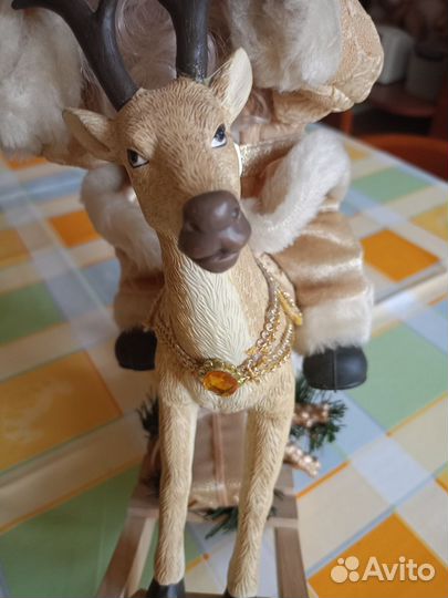 Дед мороз на олене музыкальная игрушка