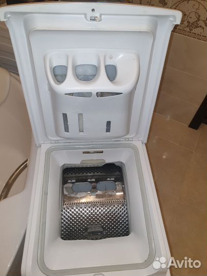 Стиральная машина с вертикальной загрузкой