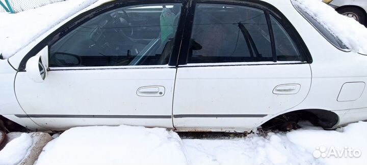 Двери Тойота карина 190